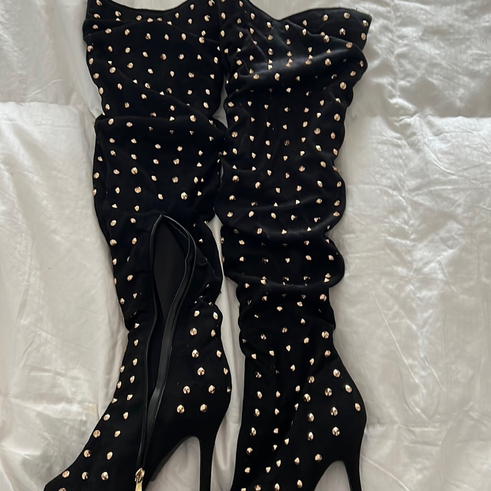 Slightly worn knee high boots. Worn once